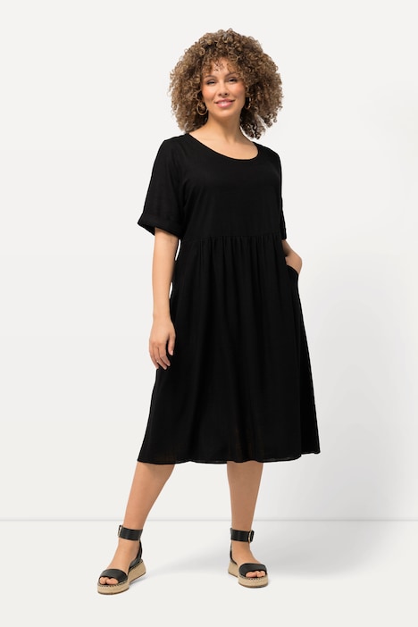 Abito da campionario nero Black Beauty con mezze maniche e tasche laterali