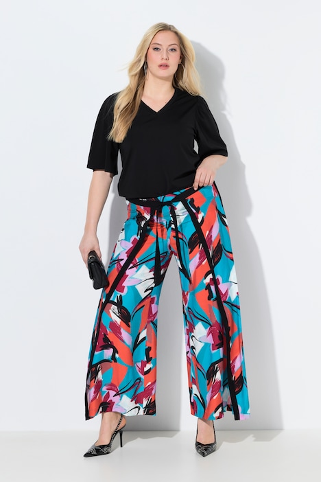 Pantaloni modello Rose con effetto incrociato, taglio della gamba ampio e cintura comoda Ulla Popken colore aqua turchese indossato
