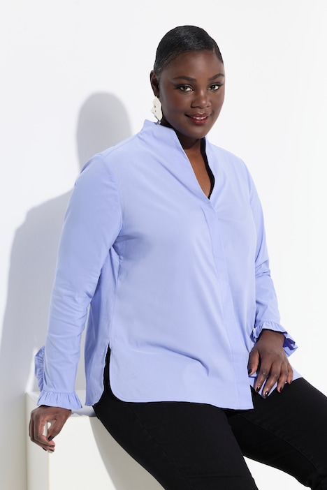 Blusa con ruches sulle maniche azzurro, indossato da modella