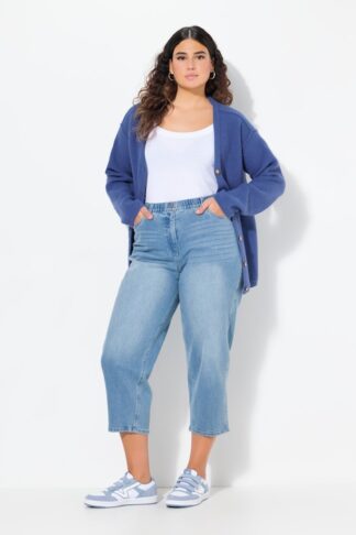 jeans Mom Fit con gamba affusolata e fantasia digitale denim blu chiaro, indossato da modella